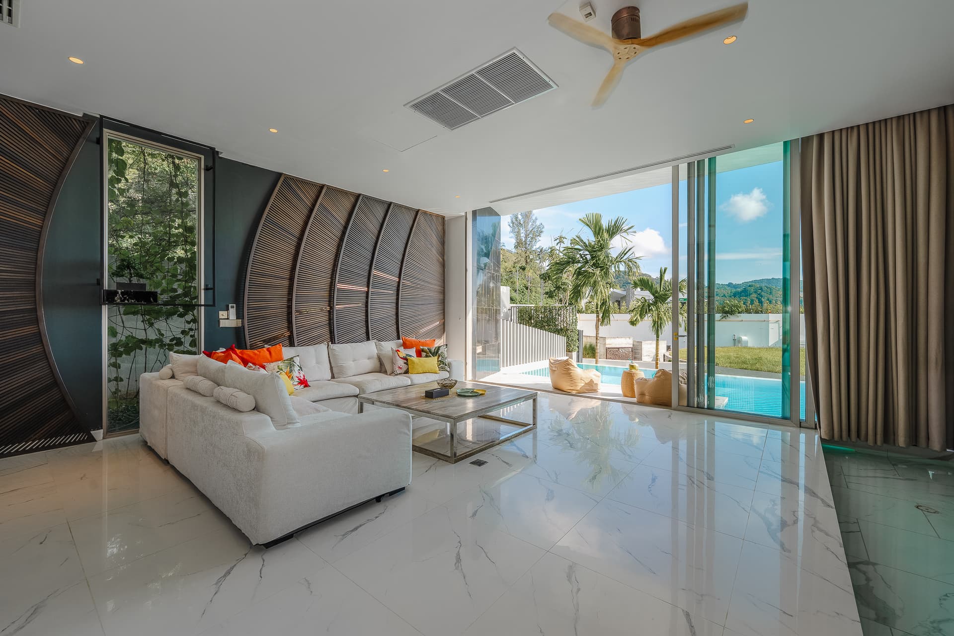 Sea-View 4-Bedroom Villa — Kata Noi — Living space beside the pool