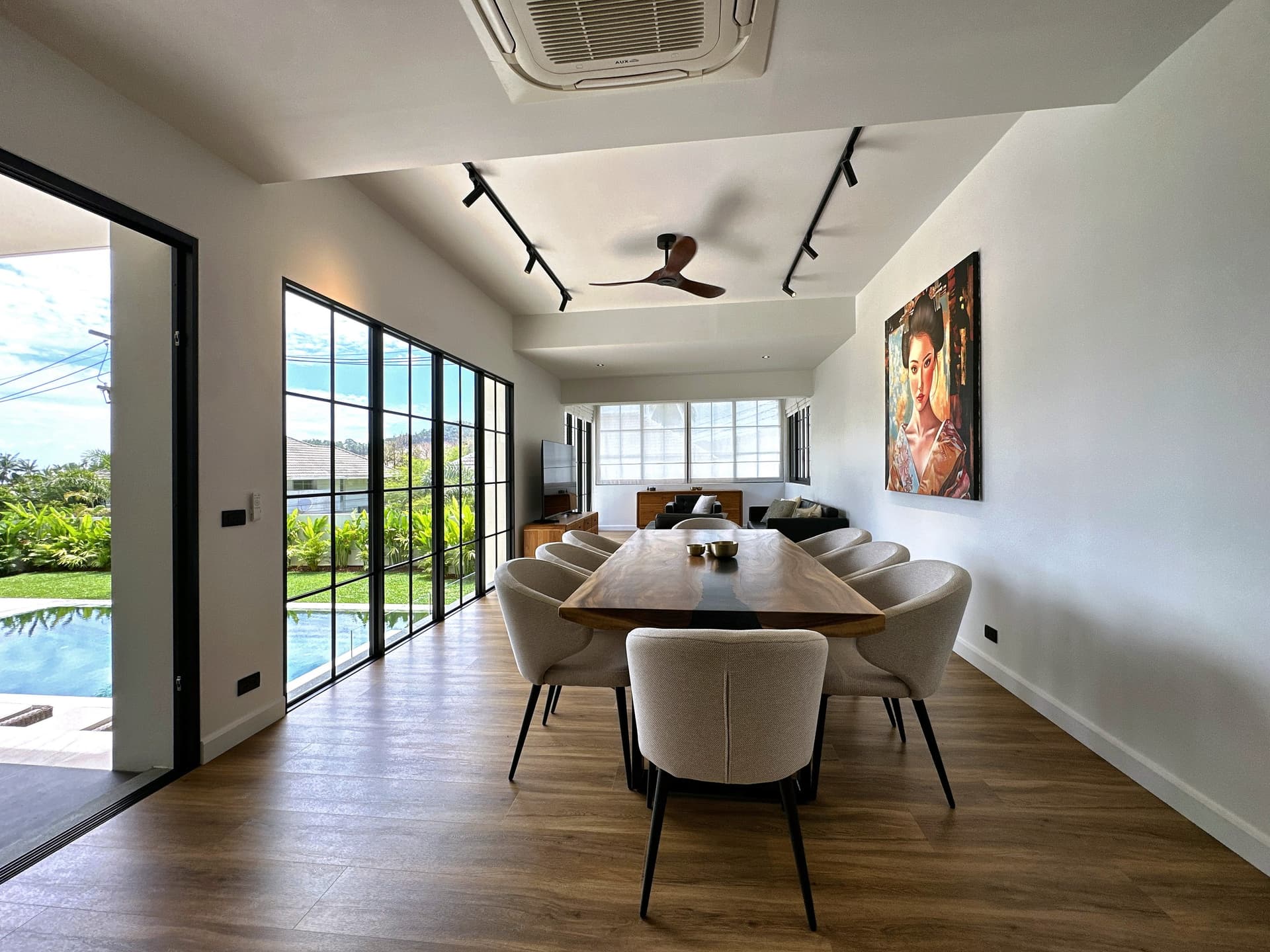 Just-finished two-storey villa on a 607 m² — The living room, the kitchen, the garden
