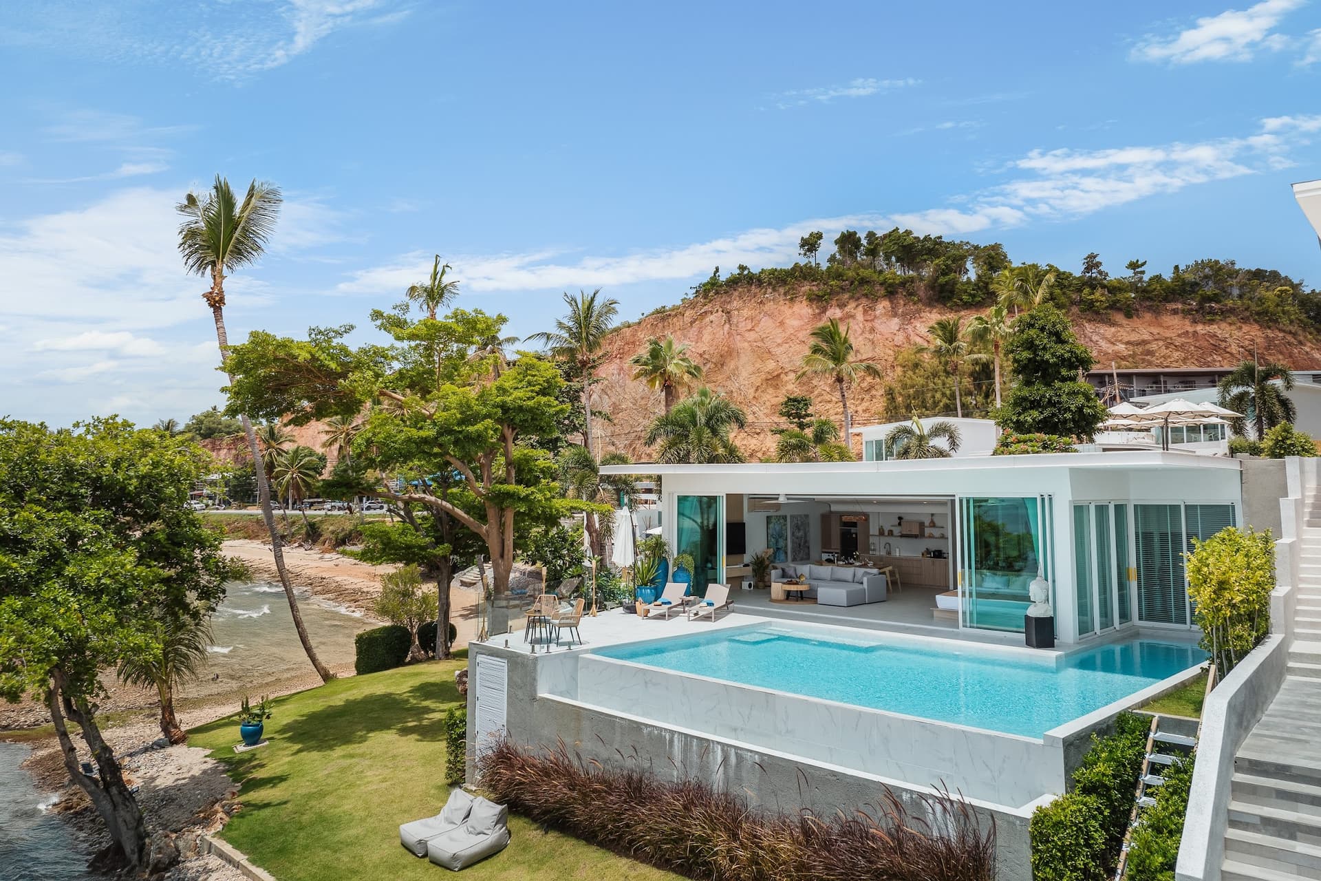 Beachfront 1-Bedroom Pool Villa — Bang Rak — The pool at the edge of the beach