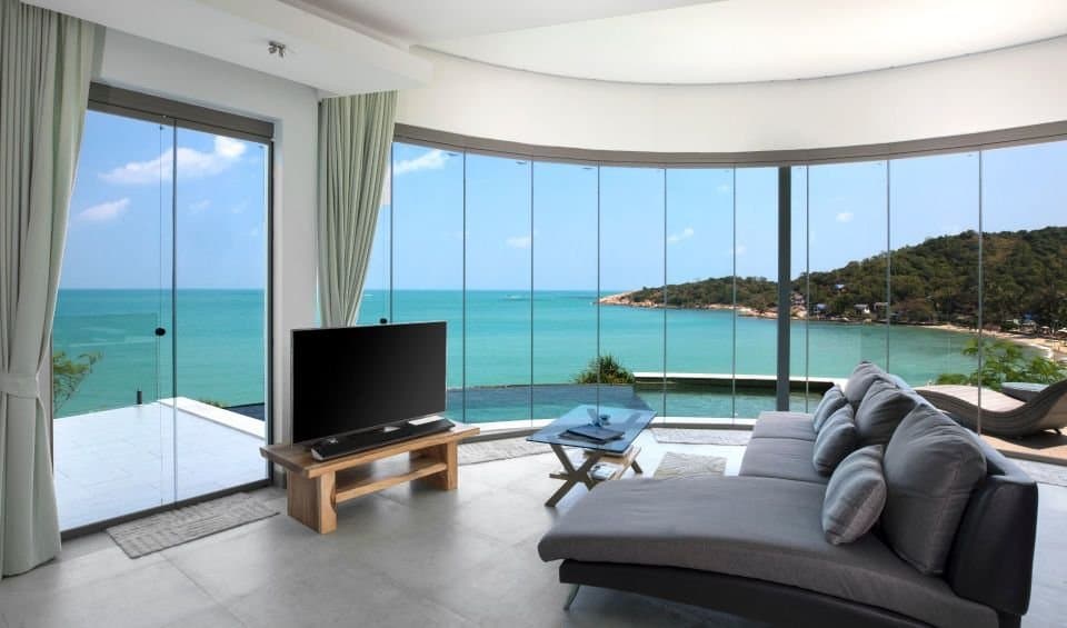 Ocean Front Retreat — A balcony room over Tongson Bay
