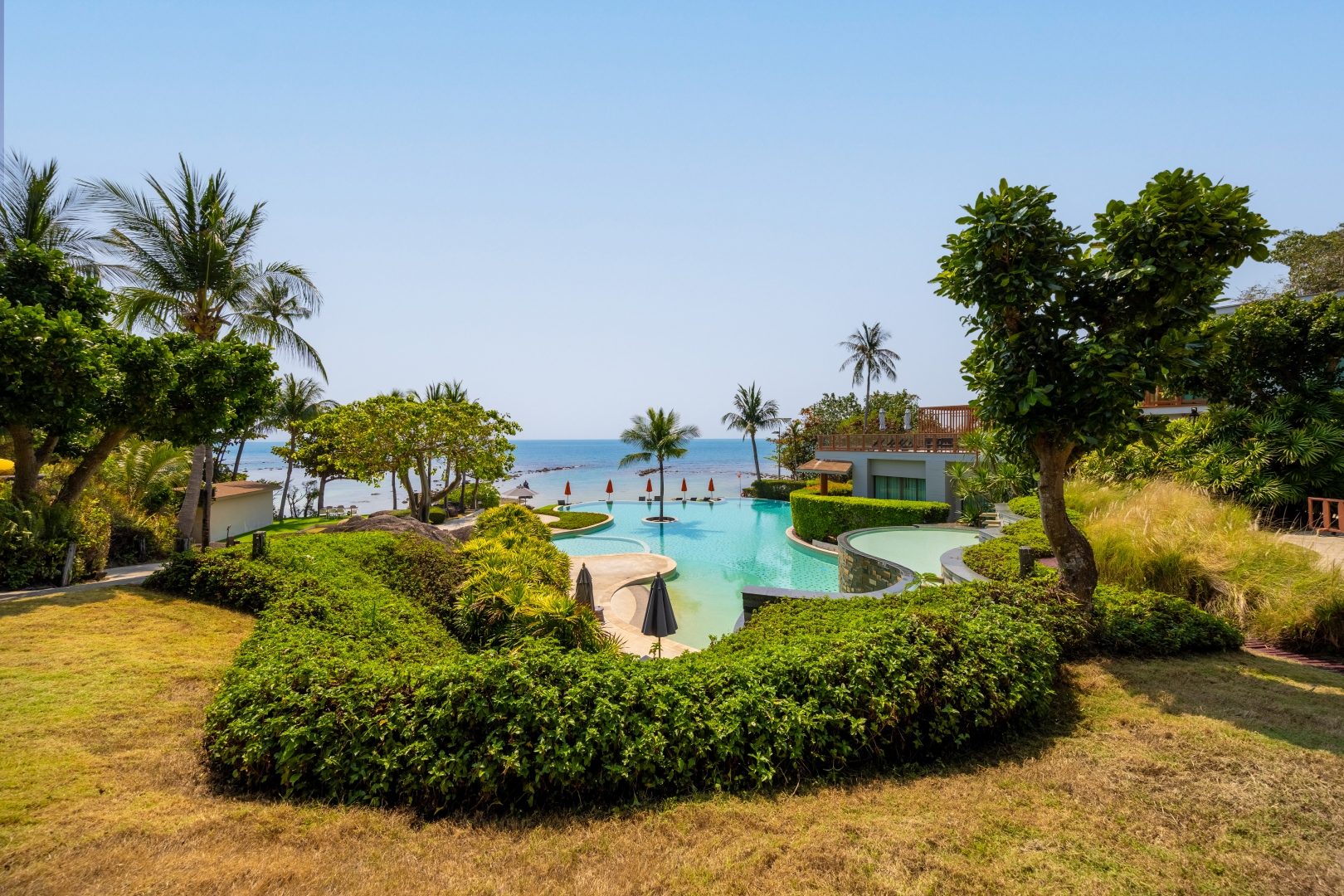 2-Bedroom Villa — Laem Set — Rocks, palms and quiet water